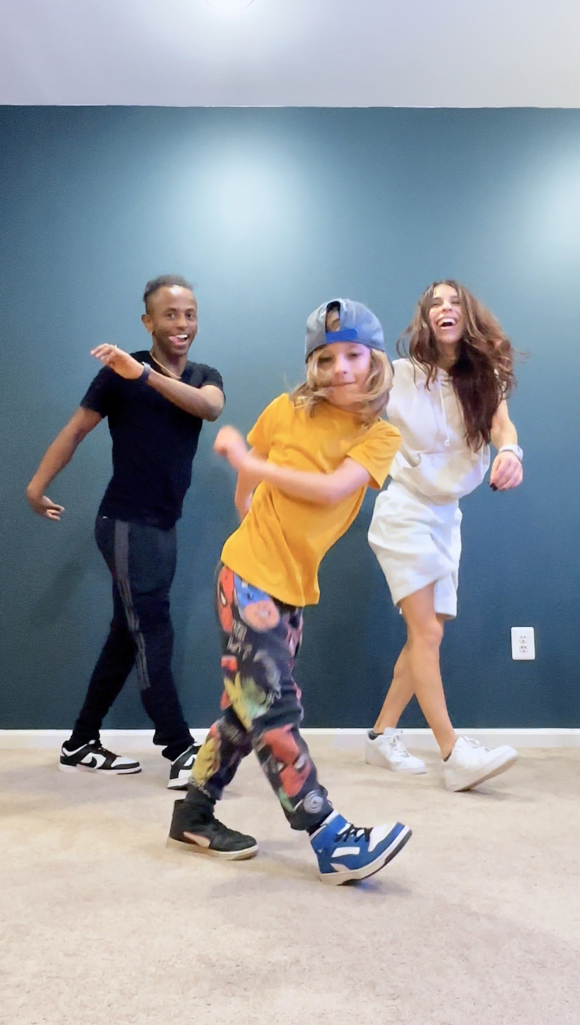 Meni in a dance collaboration with dancers Samie Schmidt and Remy Schmidt, 2023.