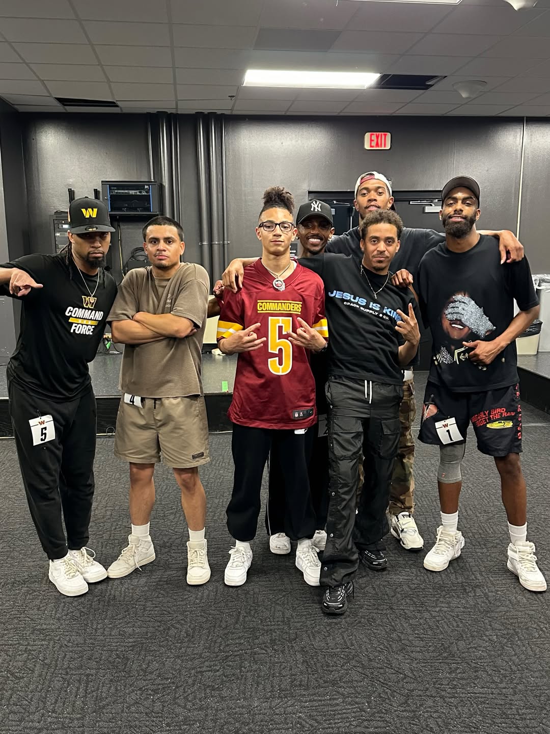 Meni in a group picture with choreographers Philly2Fly and YoShellz, May 2026.