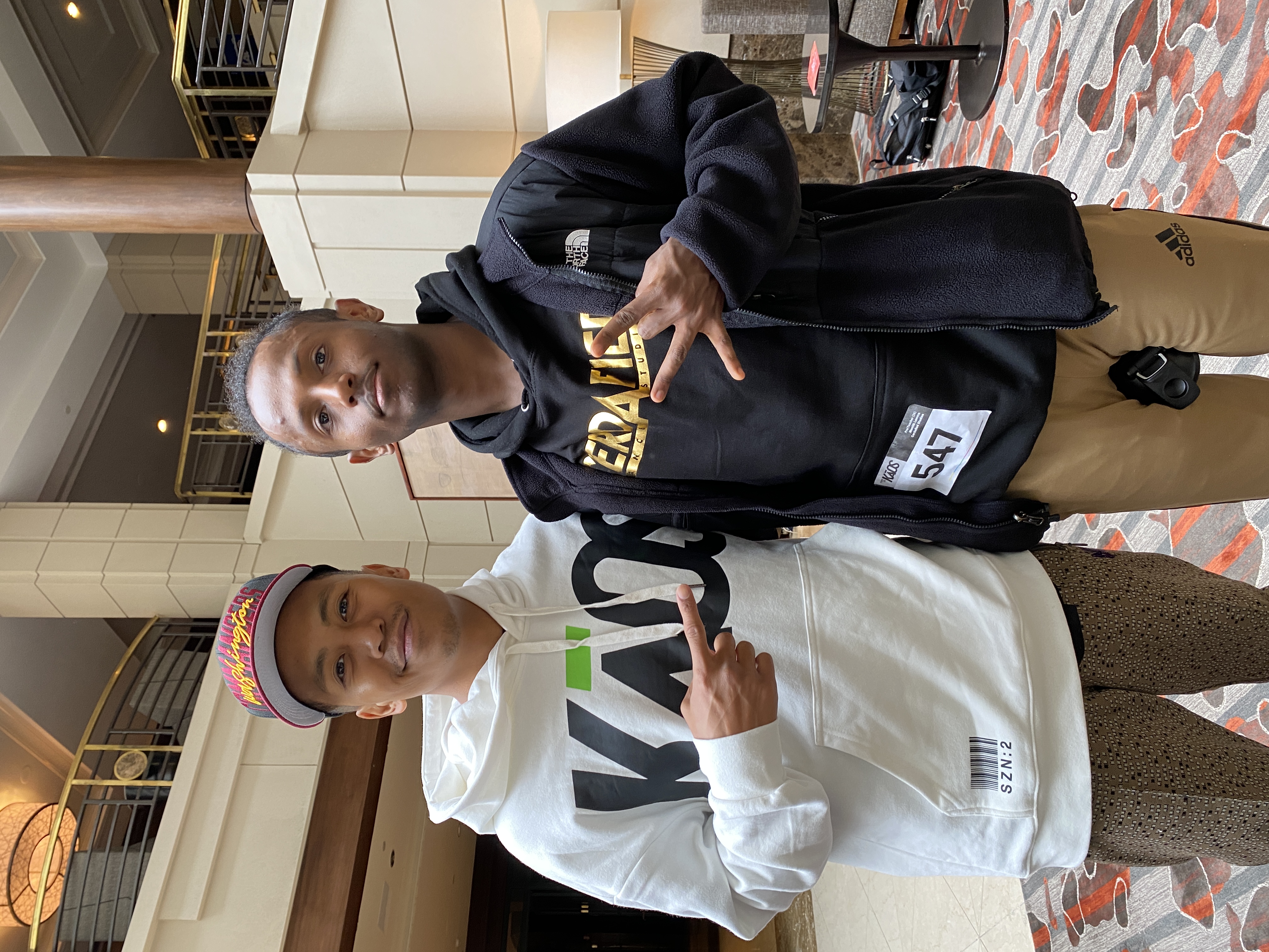 Meni with choreographer Lyle Beniga at KAOS Dance Convention, 2022.