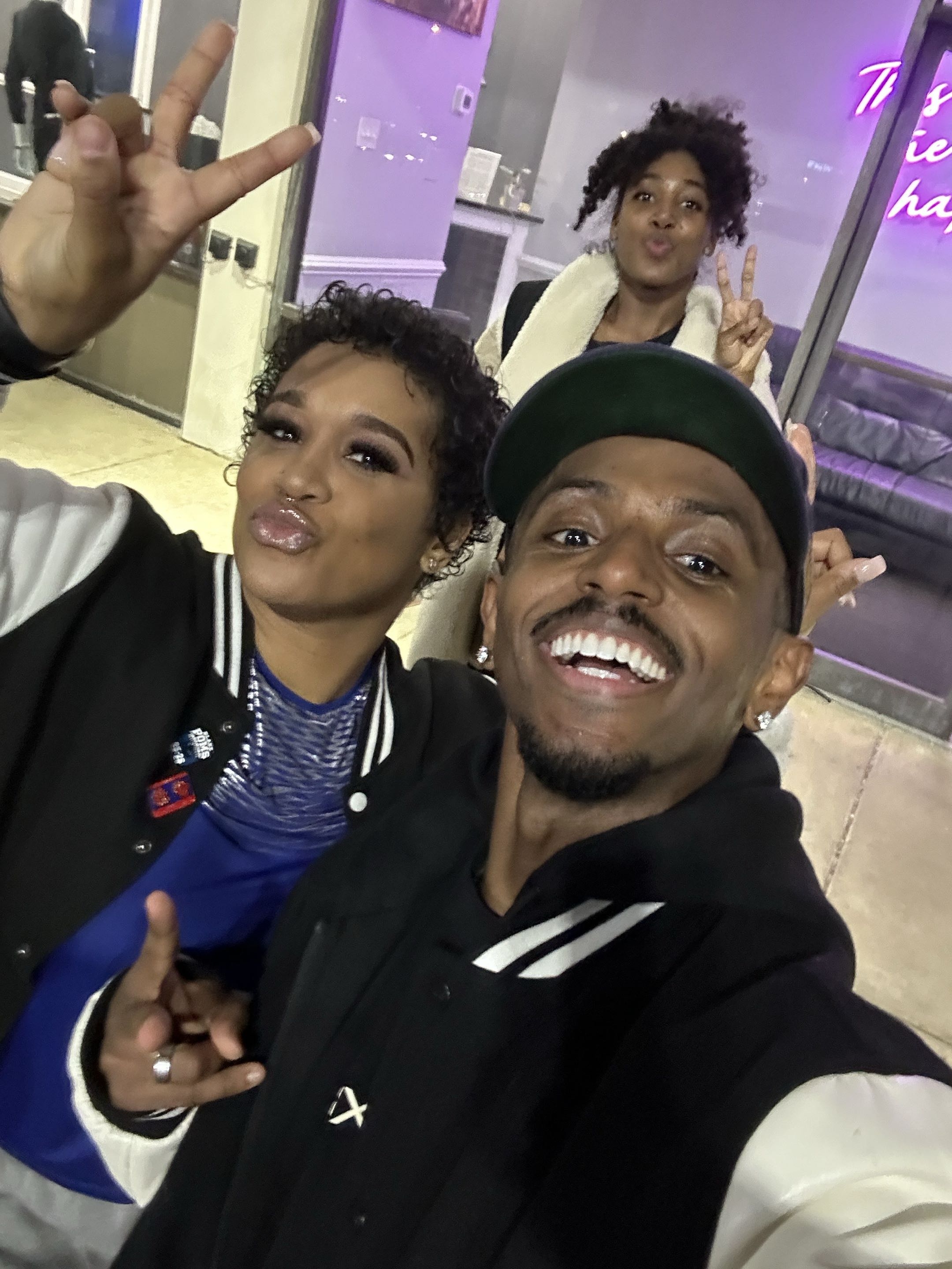 Meni with dancers Ayanna (YaYa) Quander and Arianna, March 2026.